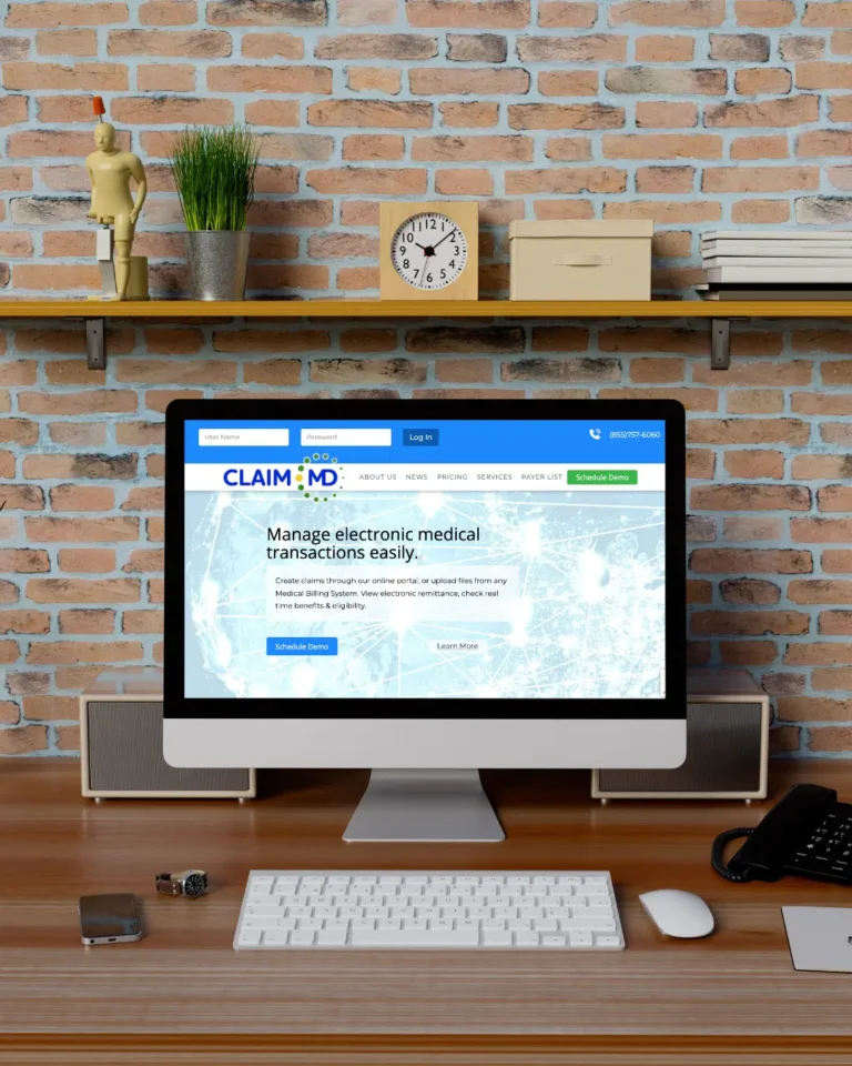 desktop computer with Claim MD website on the screen